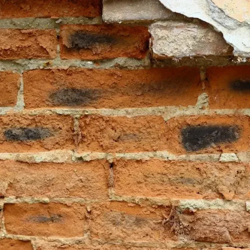 destroyed-bricks-on-an-old-wall-background